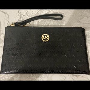 Authentic Michael Kors shiny black wristlet